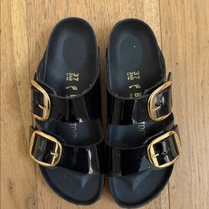 Birkenstock Arizona High Shine Patent Black Sandals with Gold Buckles